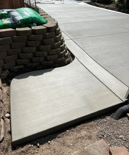 Broom Finish Driveway With Decorative Borders in Edmonds 